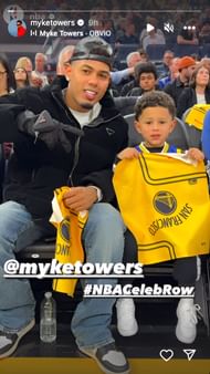 Myke Towers with son Jay Z in Warriors vs Celtics game
